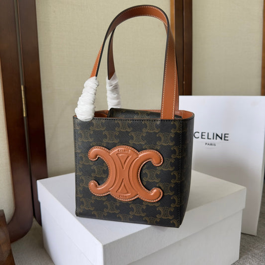 CUBE BAG 15 IN BLACK TRIOMPHE CANVAS AND BROWN CALFSKIN
